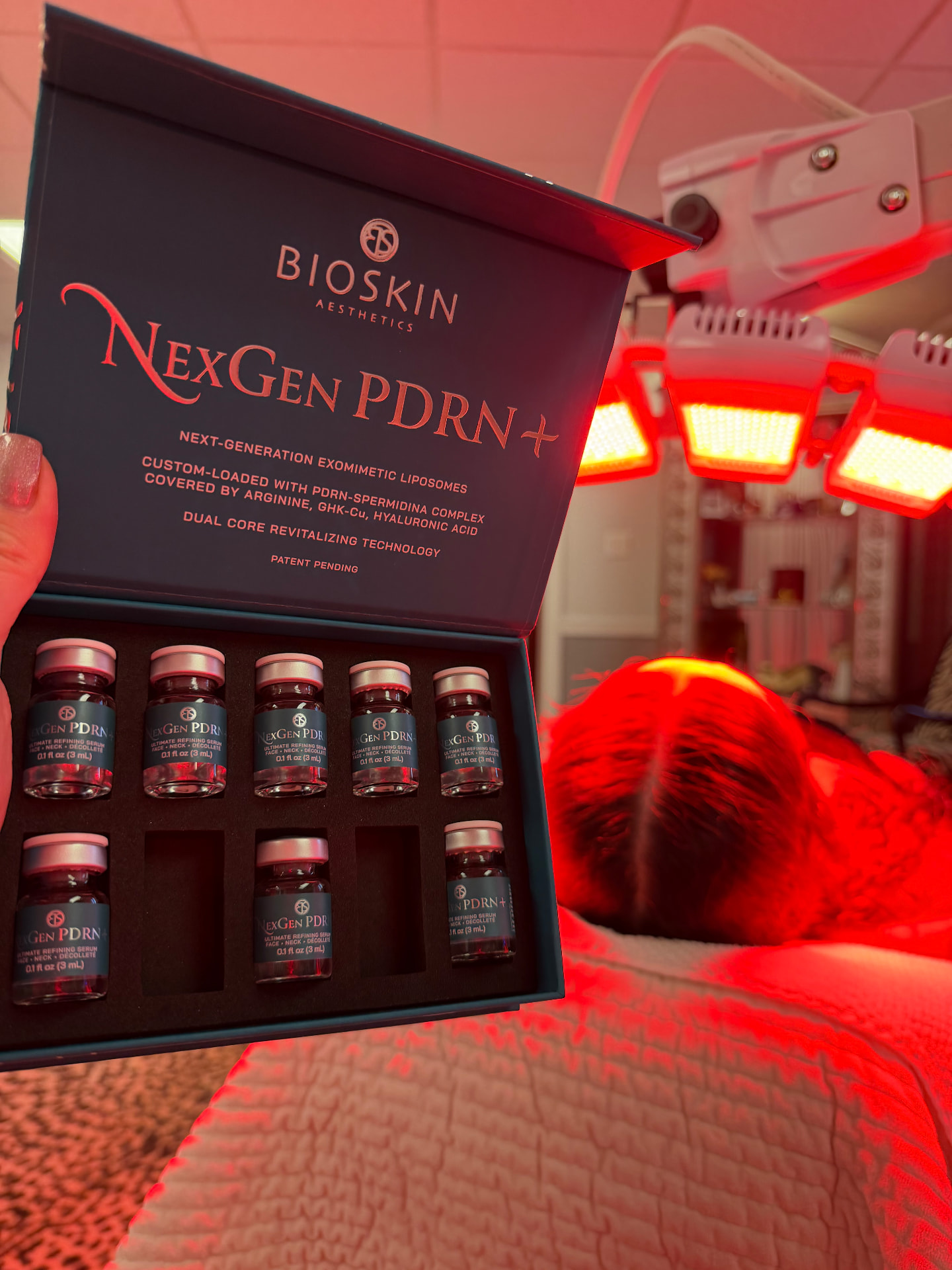NexGen PDRN+ serum vial set by BioSkin Aesthetics under LED red light therapy