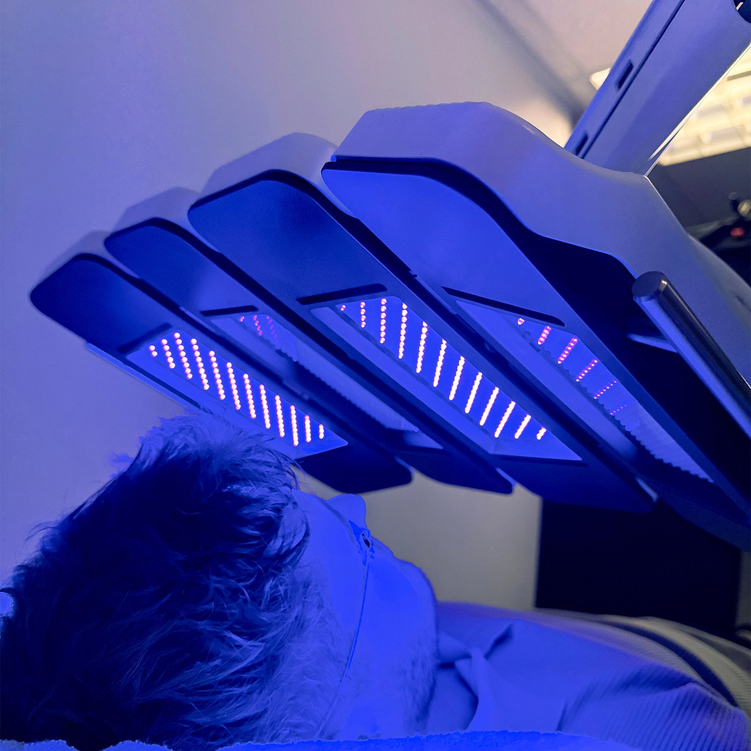Client receiving Tri-Wave MD LED phototherapy treatment