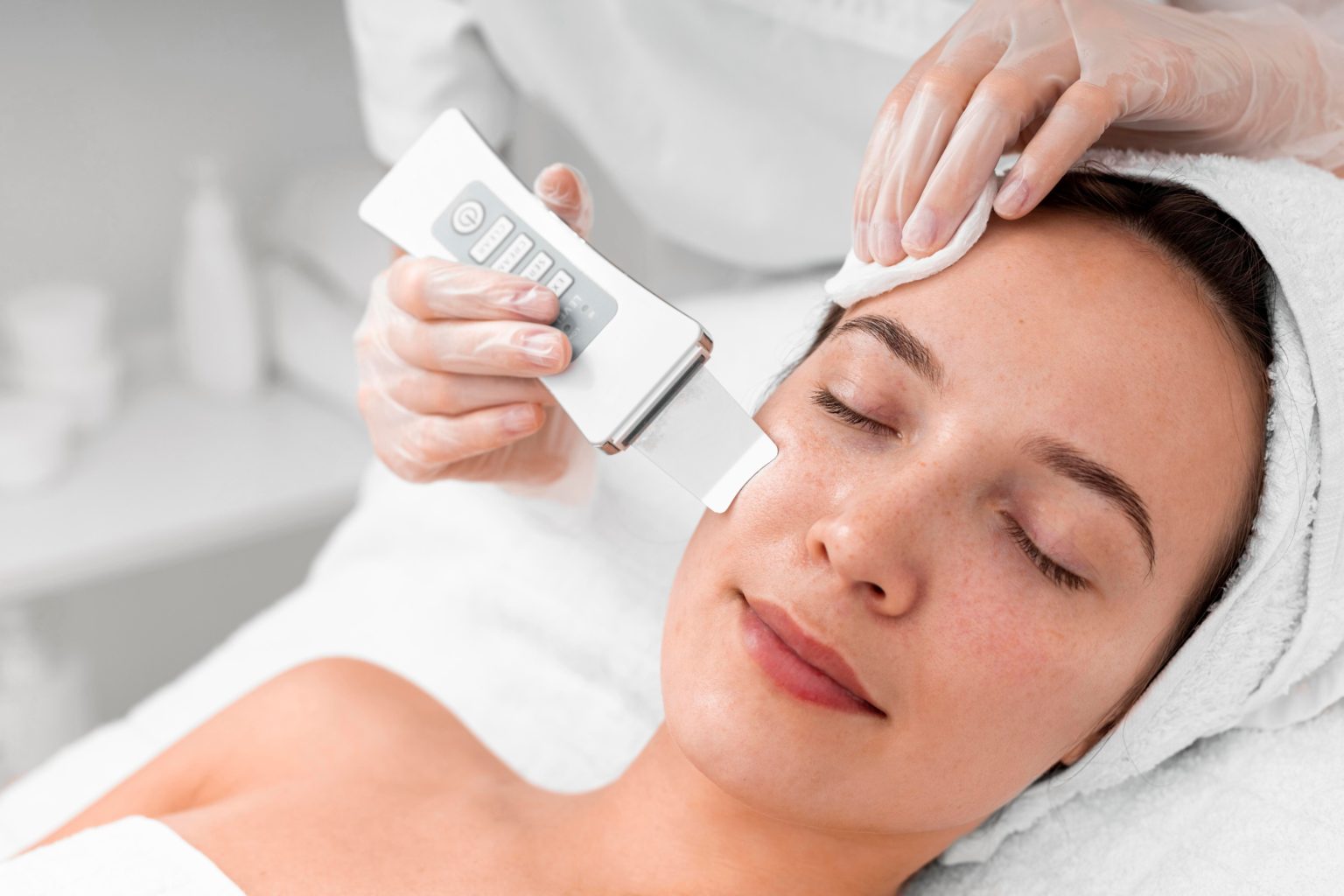 Ultrasonic Dermasound facial cleansing treatment in progress